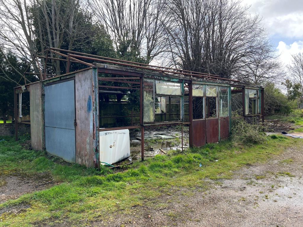 Lot: 114 - THREE-QUARTER ACRE FORMER COUNCIL DEPOT SITE WITH PLANNING FOR FIVE HOUSES - Former outbuilding